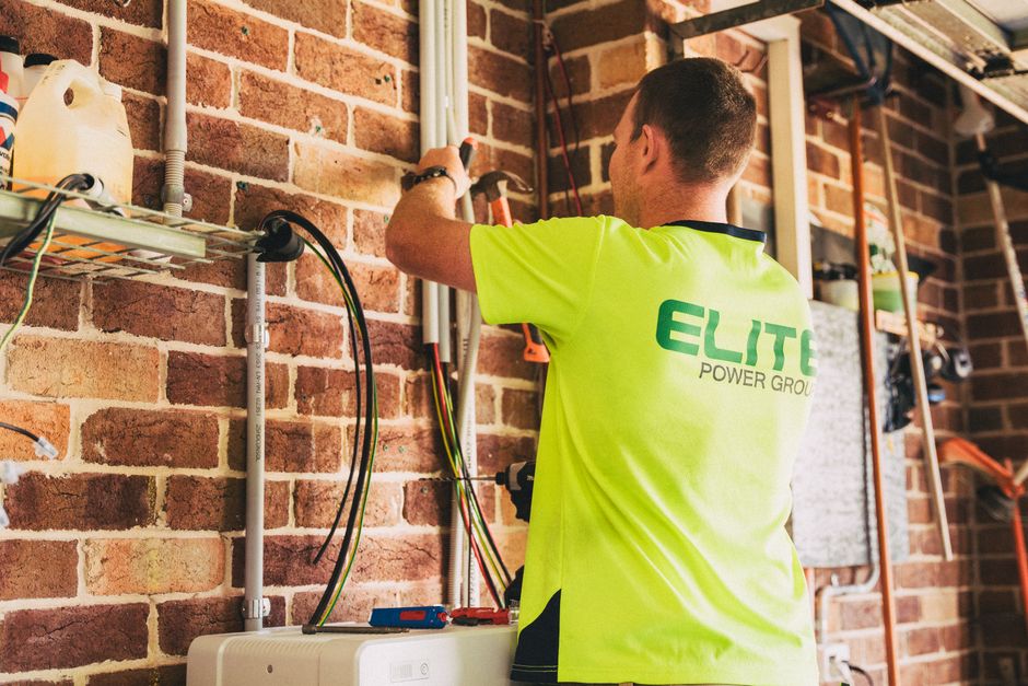 Sleek home solar battery wall installed in a garage