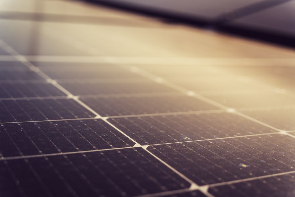 Sun shining brightly on modern residential solar panels